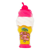 A plastic candy container shaped like a swirled ice cream cone with a cherry on top, labeled "Crazy Candy Factory - Twist 'N' Lick Candy Ice Cream Cherry, Blue Raspberry & Strawberry.